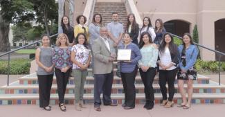 EAOP Department Staff and Director with awards.jpg EAOP Department Staff and Director with awards